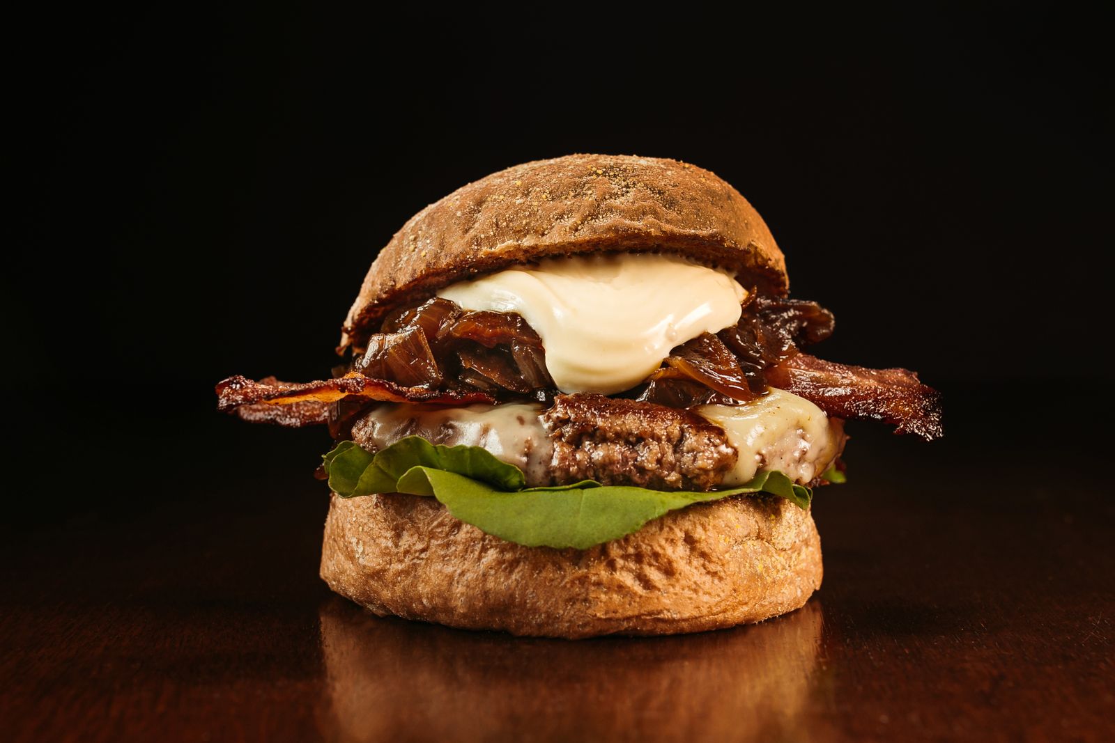 Juicy bacon cheeseburger with melted cheese