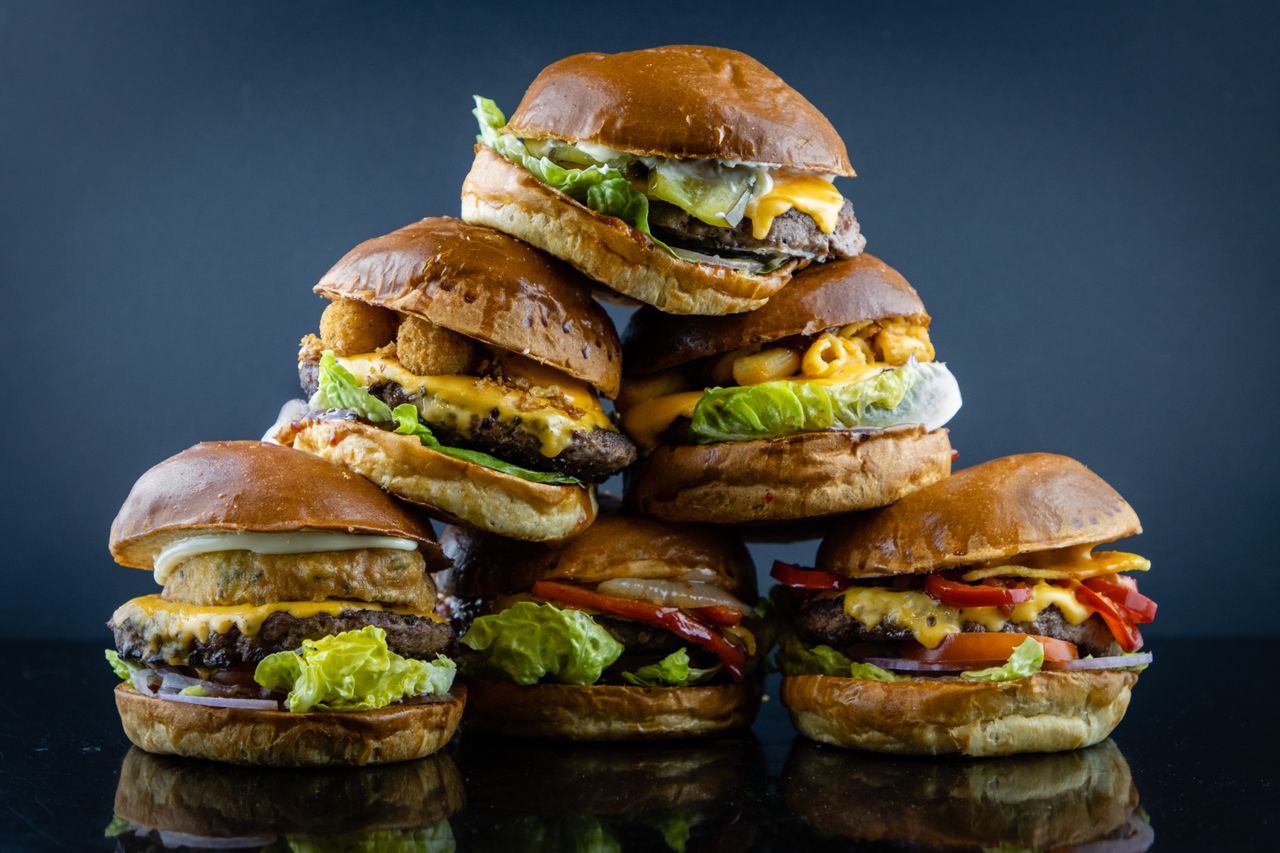 A stack of custom-built burgers
